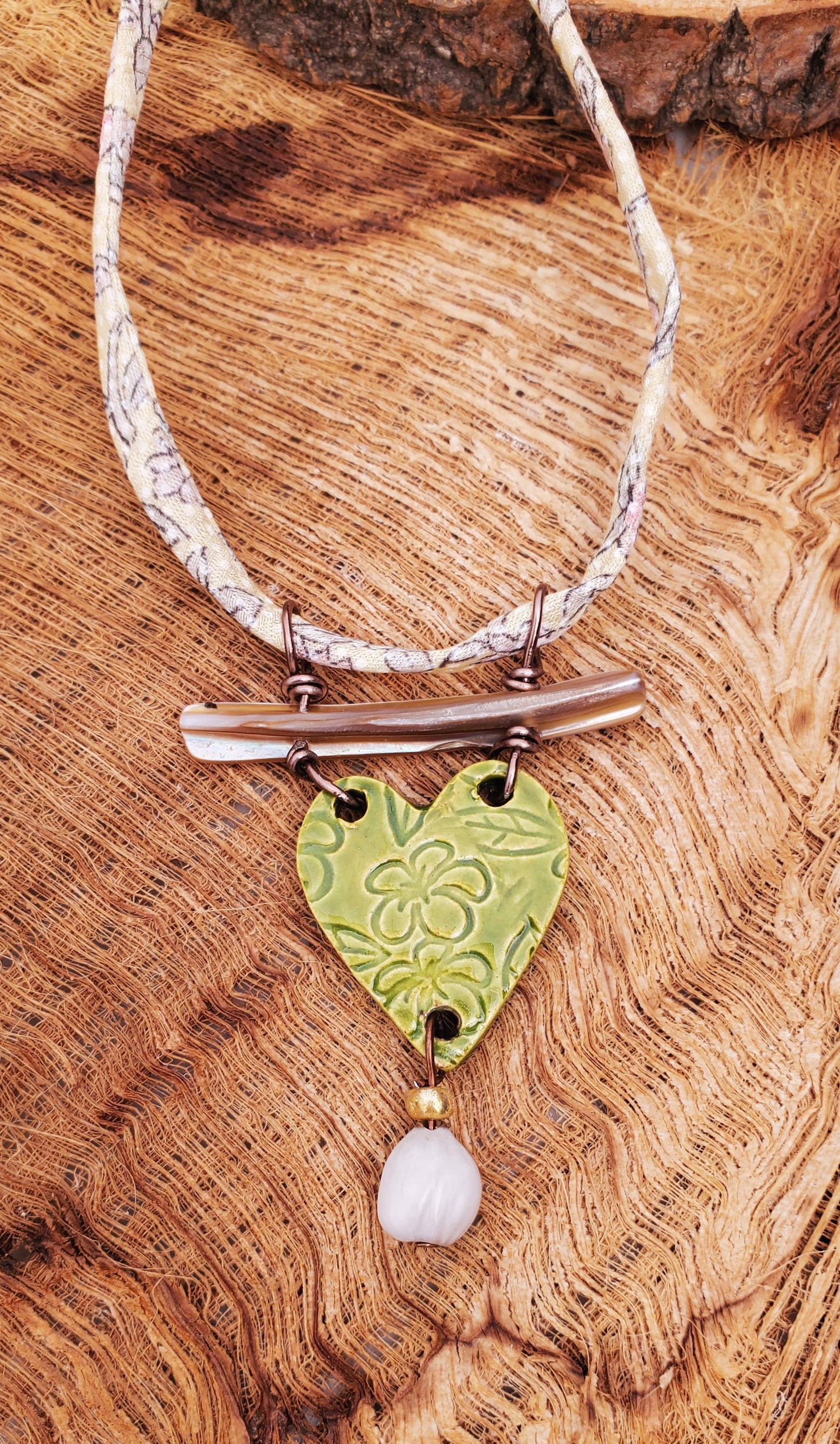 NKL-PLU03GRN: Plumeria Flowers Heart Shaped Ceramic Necklace with Abalone, Job's Tears and Repurposed Silk Kimono Cord – Green Glaze