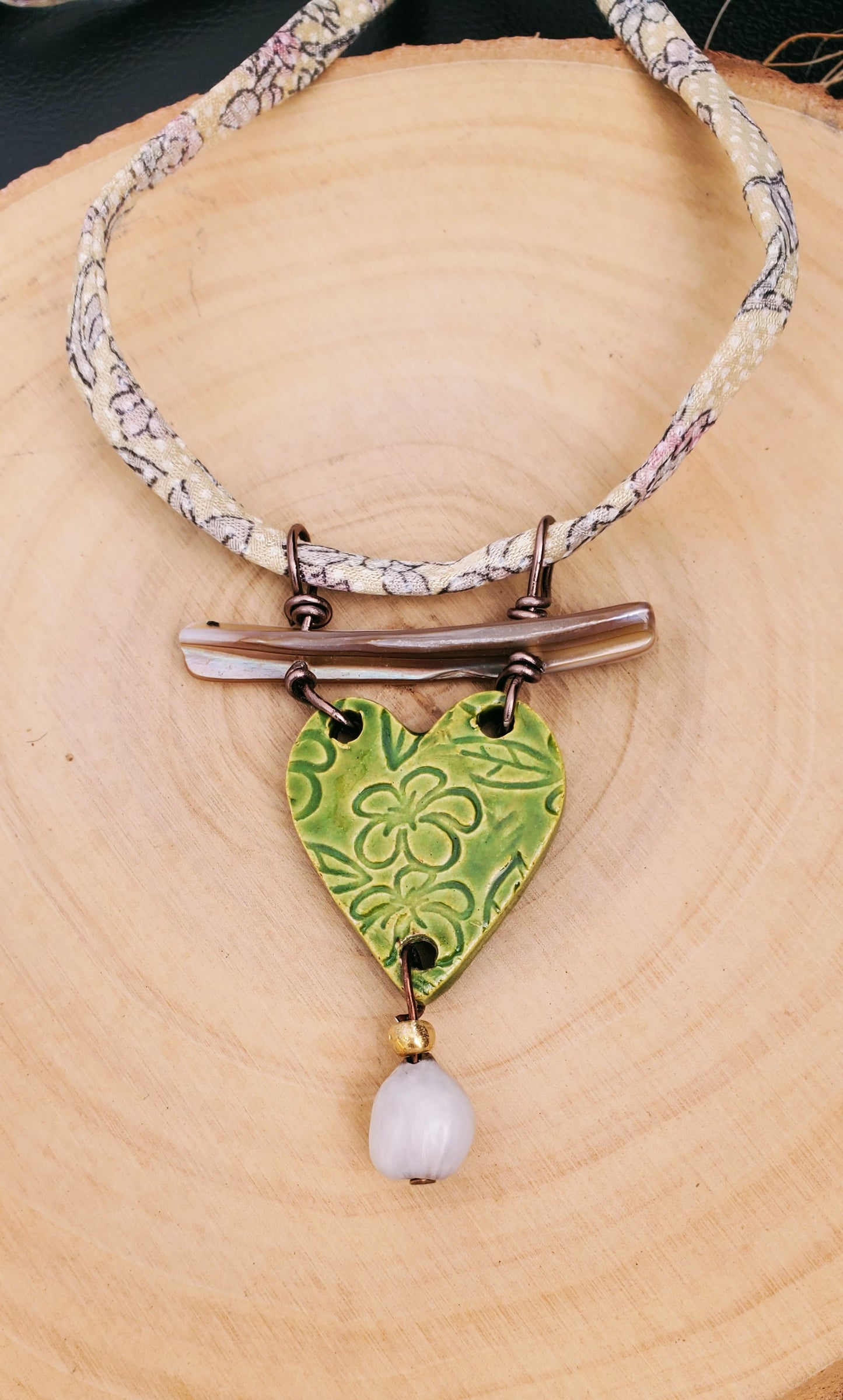 NKL-PLU03GRN: Plumeria Flowers Heart Shaped Ceramic Necklace with Abalone, Job's Tears and Repurposed Silk Kimono Cord – Green Glaze