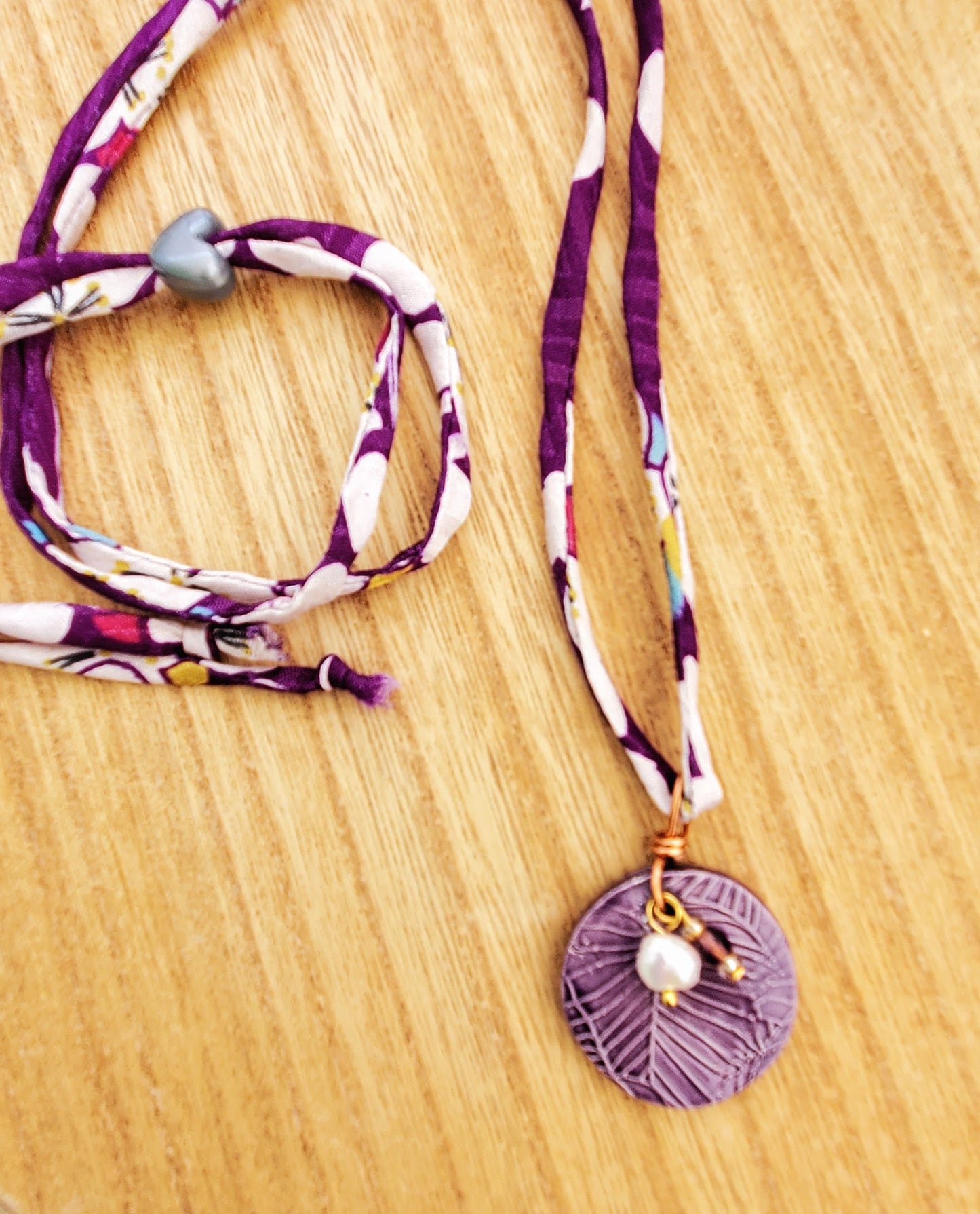 NKL-MON02PRP: Purple Monstera Leaf Ceramic Necklace with Purple Floral Repurposed Adjustable Silk Kimono Cord - Purple glaze