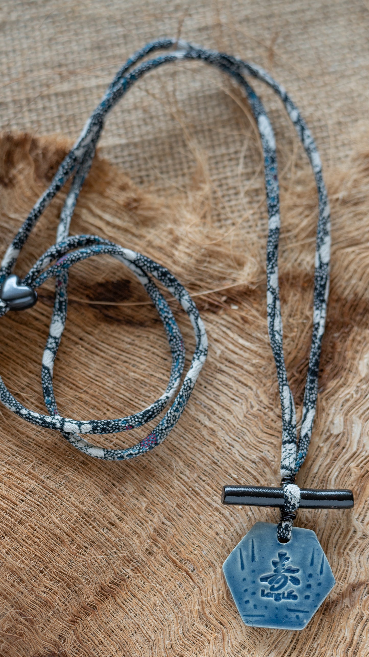 NKL-LLK01ABL: Long Life in Kanji Ceramic Necklace with Black Bamboo and Dark Floral Repurposed Adjustable Silk Kimono Cord - Dark Blue glaze