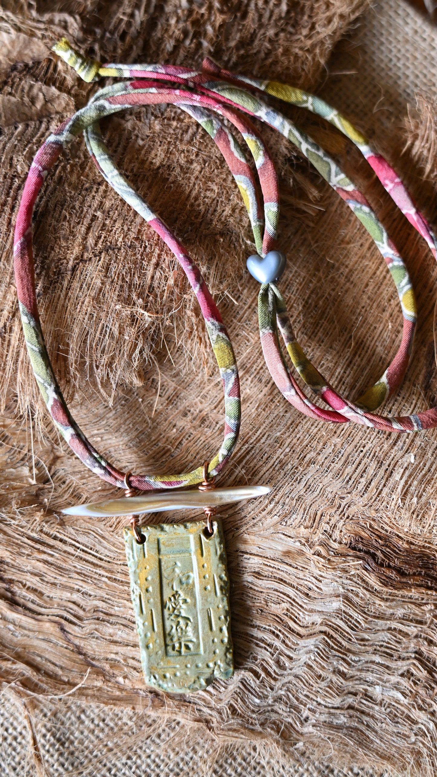 NKL-PLH01BNS: Peace, Love, Happiness in Kanji Ceramic Necklace with Abalone and Repurposed Kimono Cord