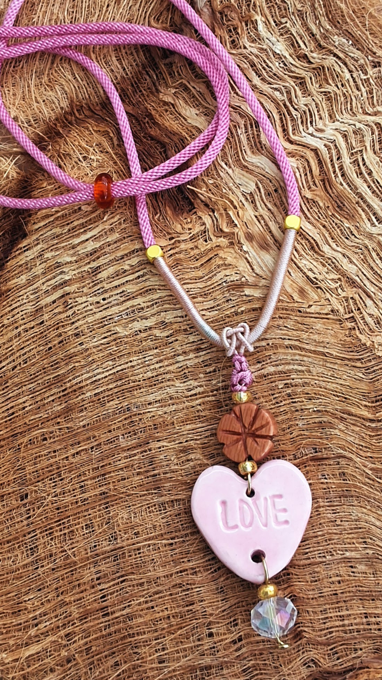 NKL-LOV02PNK: Love Heart Shaped Pink Ceramic Necklace – Braided Silk Cord