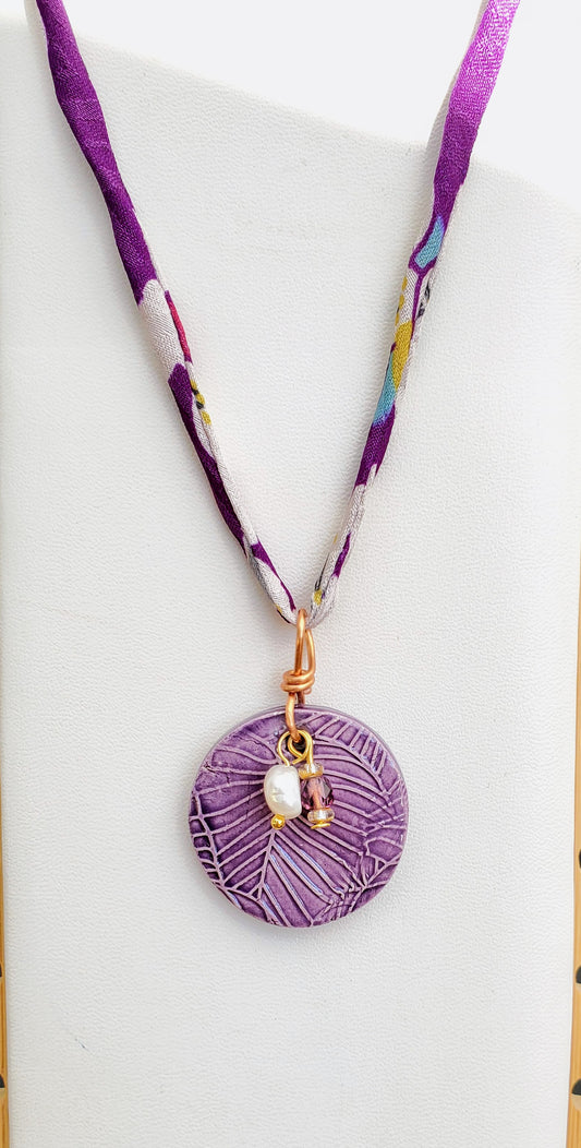 NKL-MON02PRP: Purple Monstera Leaf Ceramic Necklace with Purple Floral Repurposed Adjustable Silk Kimono Cord - Purple glaze