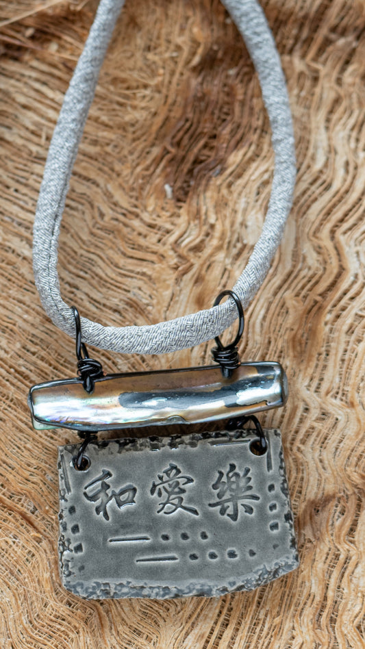 NKL-PLH02GRY: Peace, Love, Happiness in Kanji Ceramic Necklace with Abalone and Grey Repurposed Silk Kimono Cord