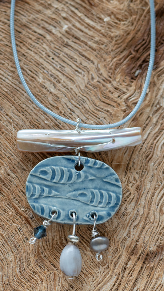 NKL-FSH01DNB: Fishes Ceramic Necklace with Natural Abalone, Job's Tears and Thin Blue Paracord – Light Blue Glaze
