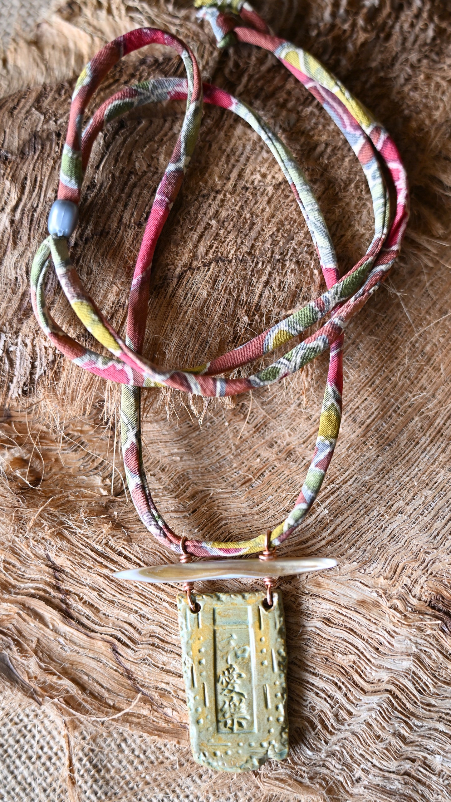 NKL-PLH01BNS: Peace, Love, Happiness in Kanji Ceramic Necklace with Abalone and Repurposed Kimono Cord