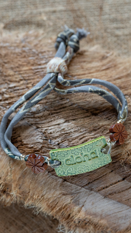 BLT-ALO02GRN: Aloha and Leis Ceramic Bracelet, Green Glaze, Wood Flowers, Repurposed Silk Kimono Cord