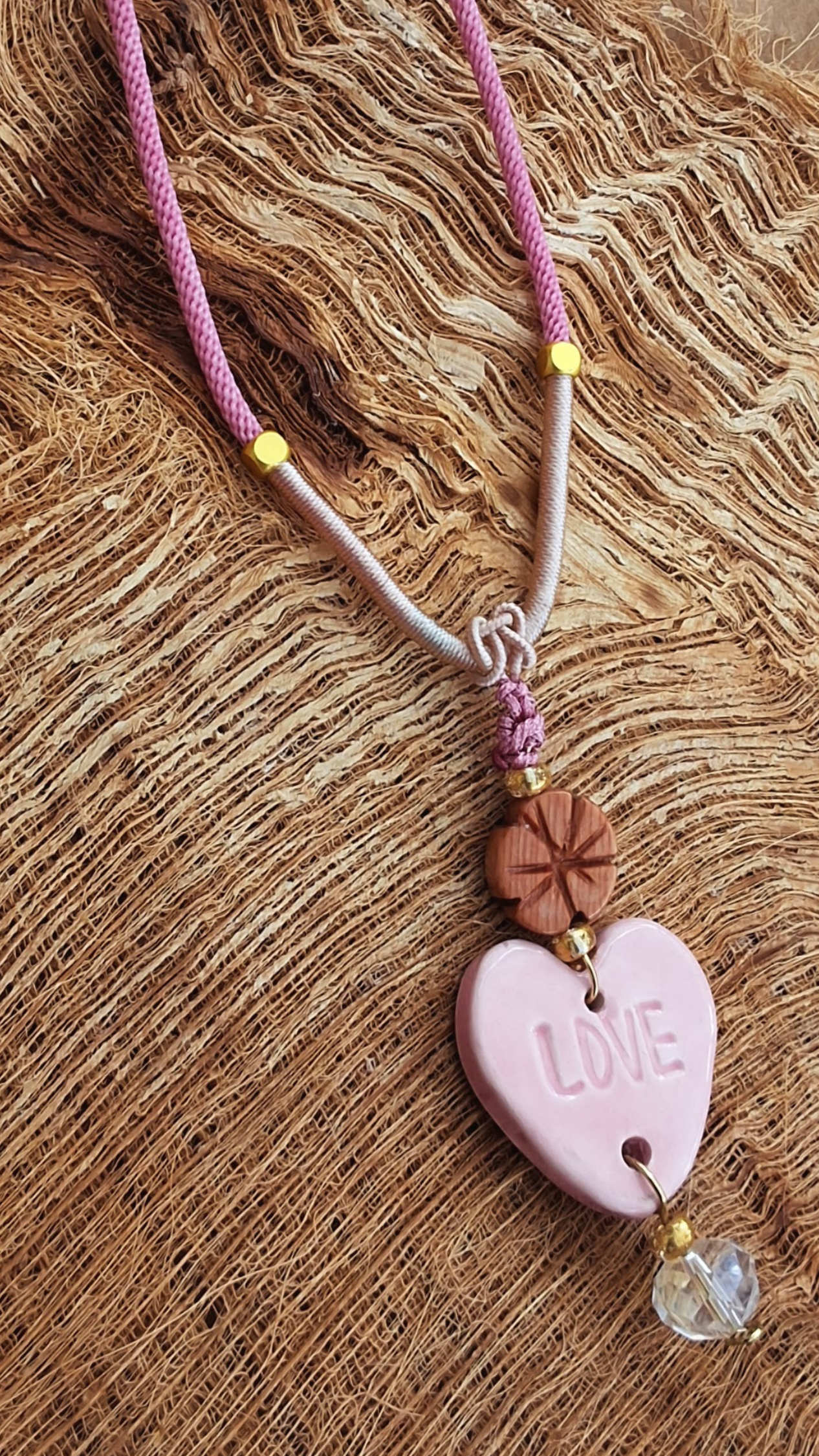 NKL-LOV02PNK: Love Heart Shaped Pink Ceramic Necklace – Braided Silk Cord
