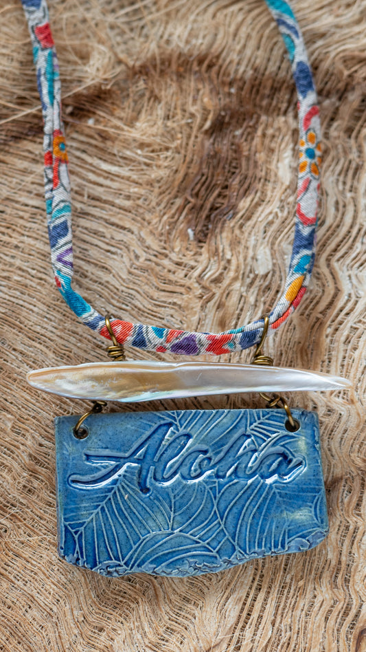 Handcrafted Ceramic Necklace with the word Aloha glazed in dark blue with Abalone and Repurposed Silk Kimono