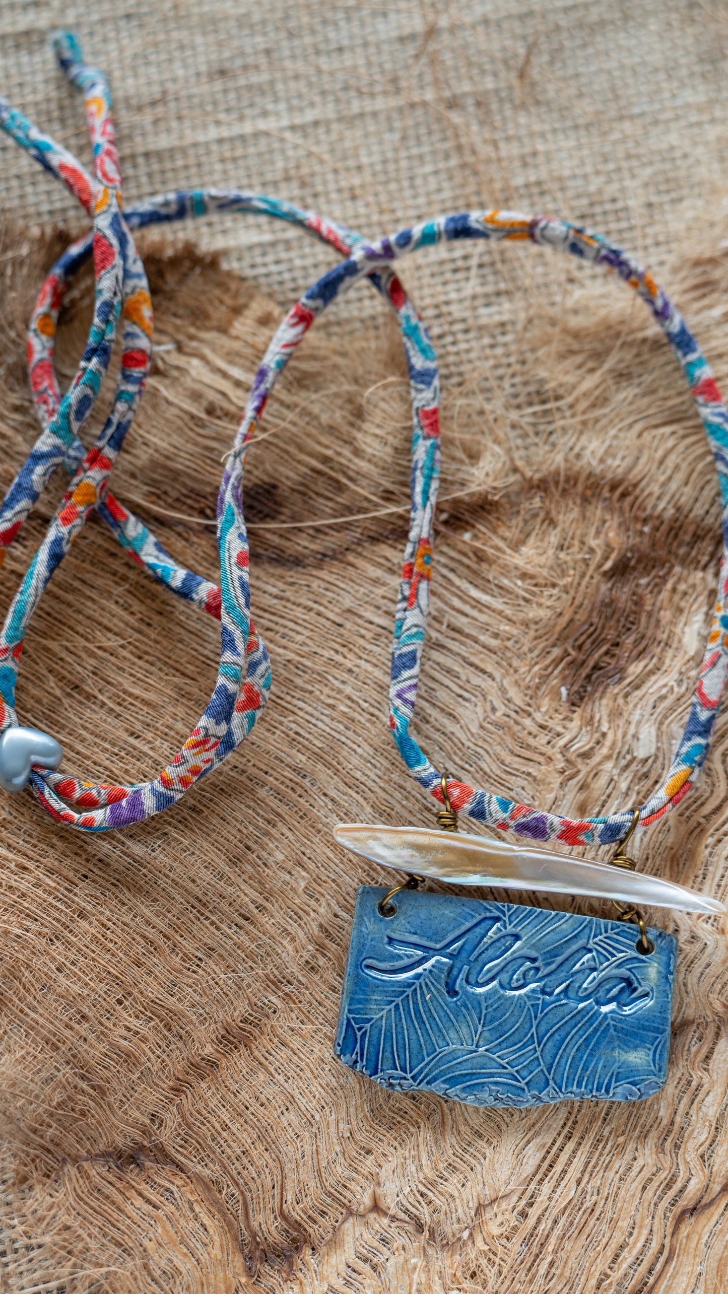 Handcrafted Ceramic Necklace with the word Aloha glazed in dark blue with Abalone and Repurposed Silk Kimono